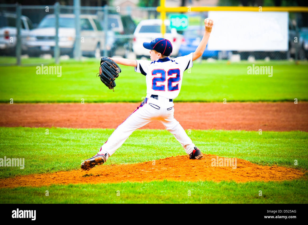 Little league pitcher about to throw the pitch Stock Photo Alamy
