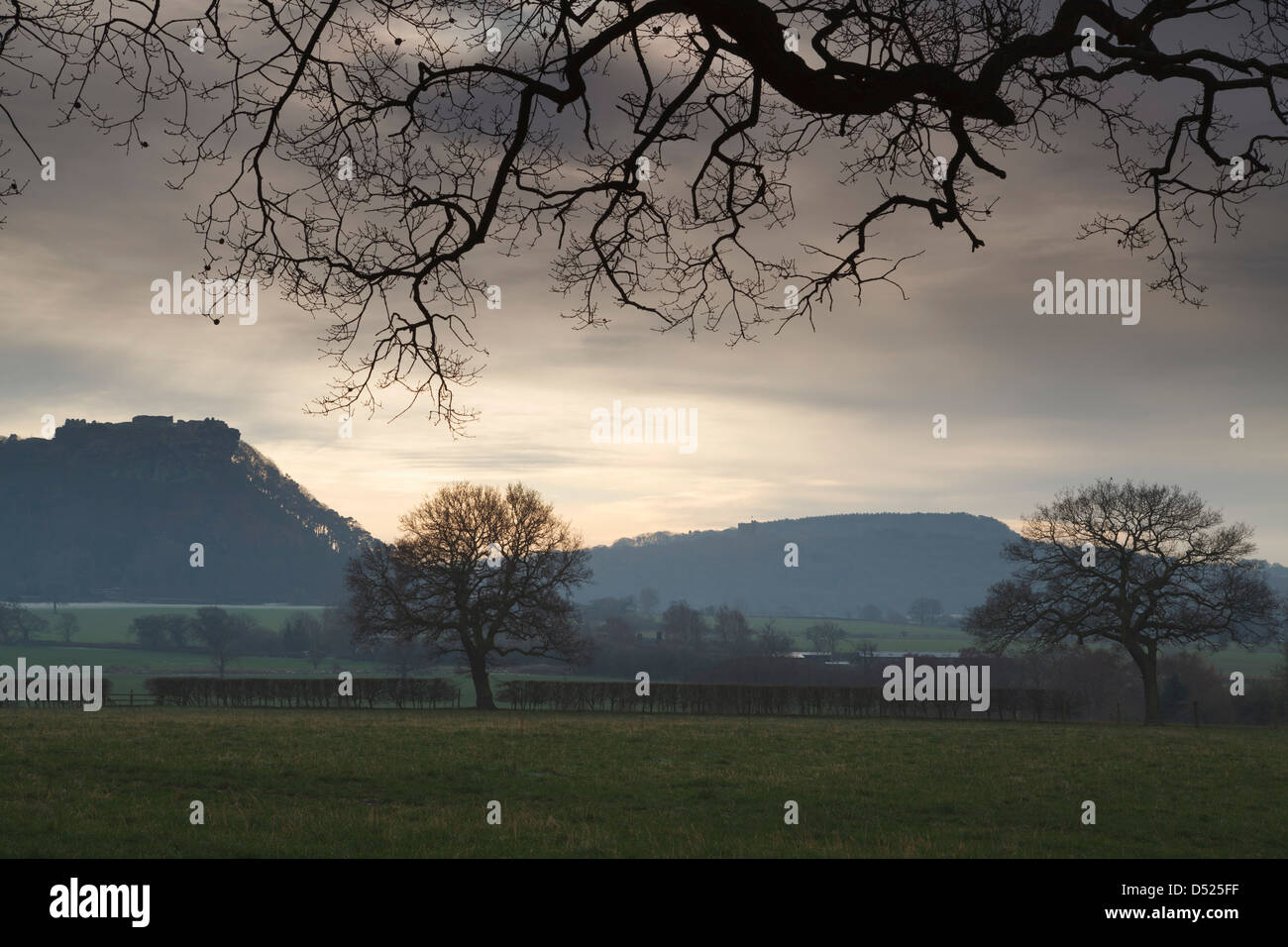 Beeston & Peckforton Castle's silhouetted on a dark moody mysterious