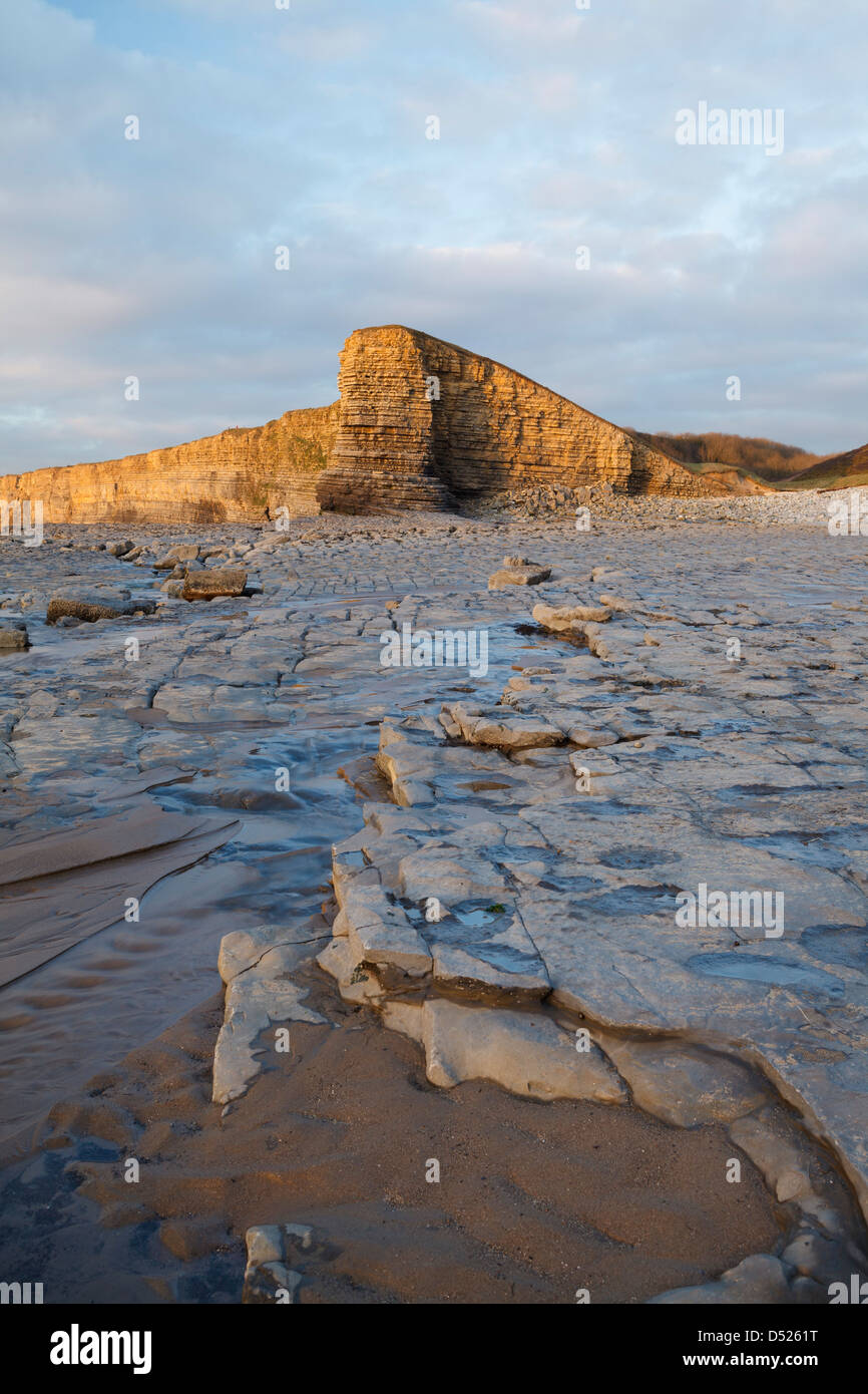 Golden sunlight on the rocks and Cliffs at Nash point, Wales. Stock Photo