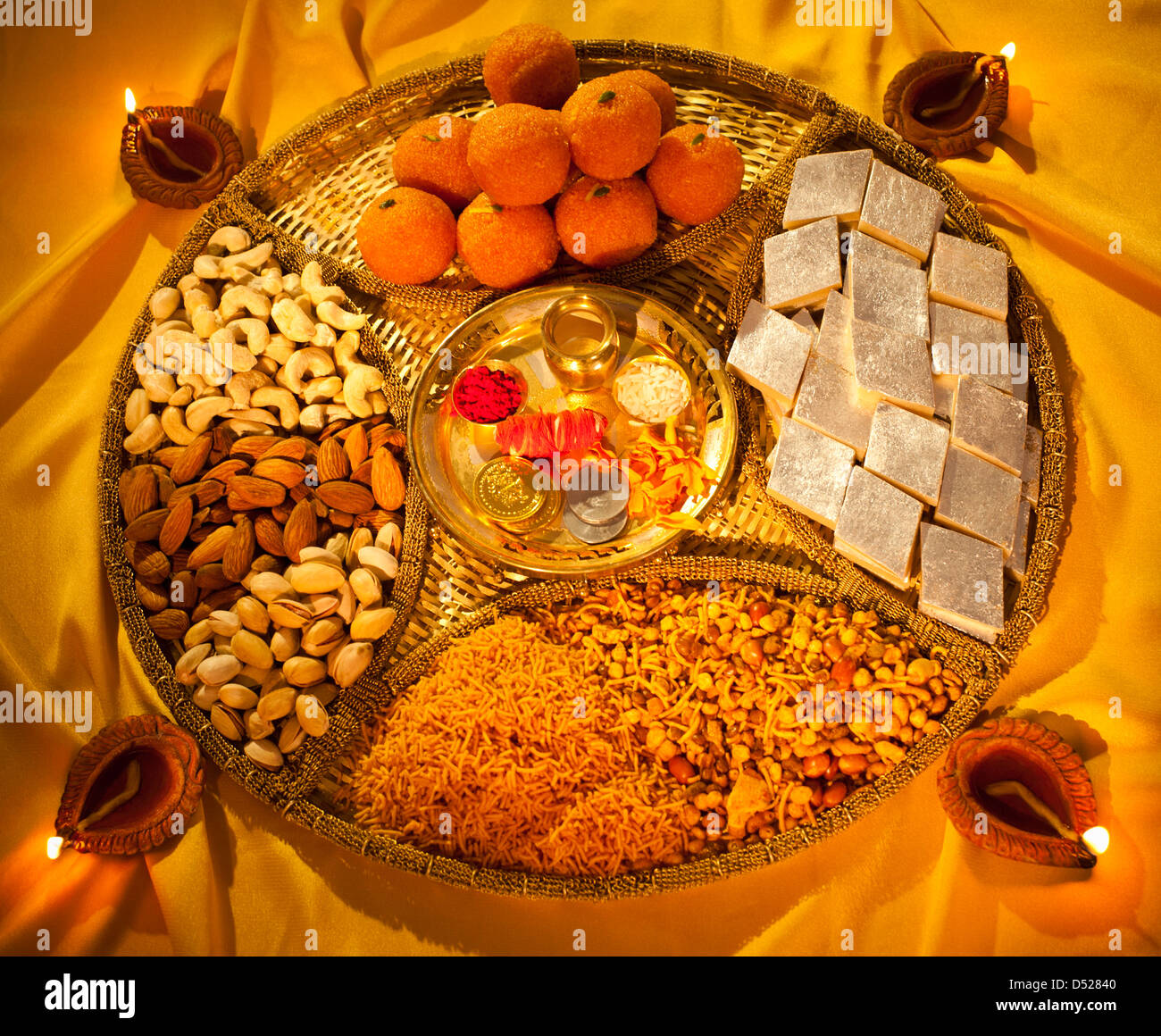 Assorted Diwali Sweets And Snacks With Diwali Diyas Stock Photo Alamy