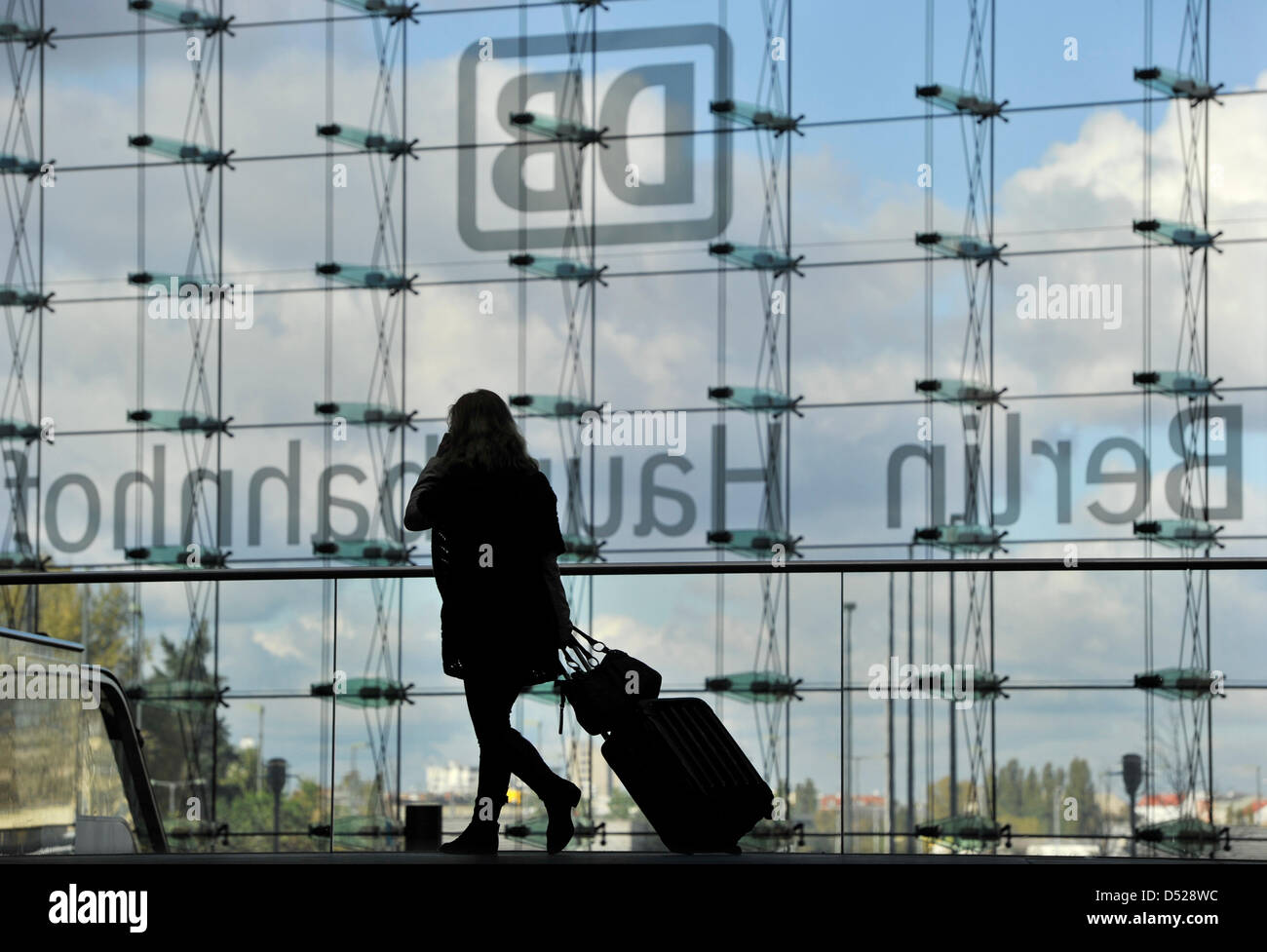 A Traveller carries luggage at the central station in Berlin, Germany
