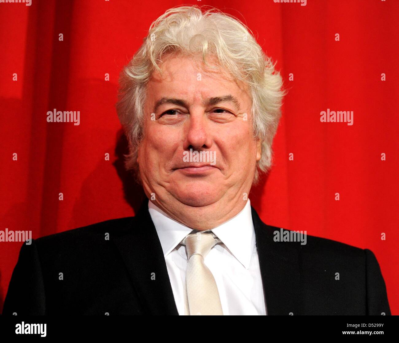 Welsh writer Ken Follett poses on stage during the premiere of 'The