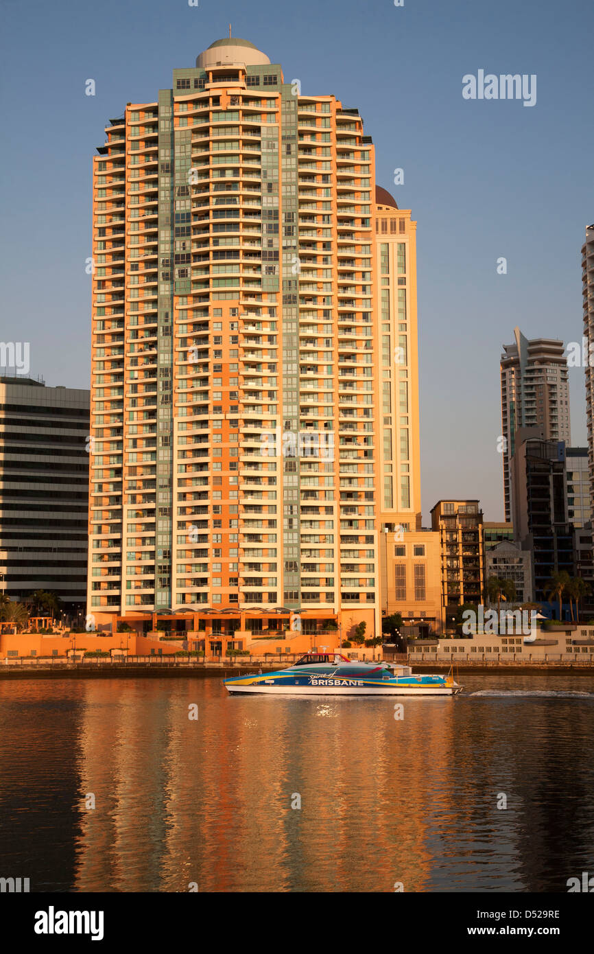 Sunrise over Residential Apartment Buildings on the Brisbane River