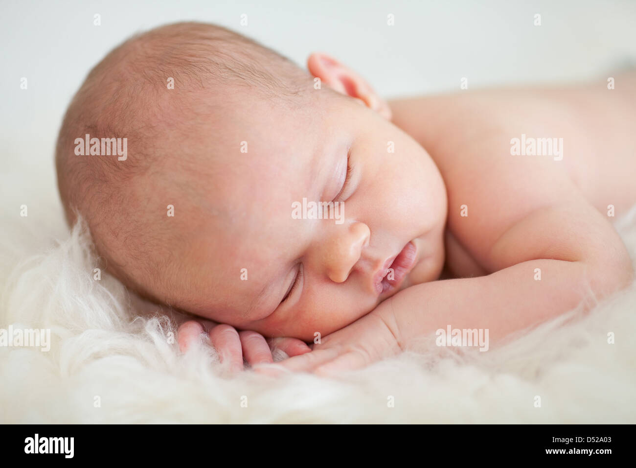 adorable baby sleeping on stomach Stock Photo Alamy