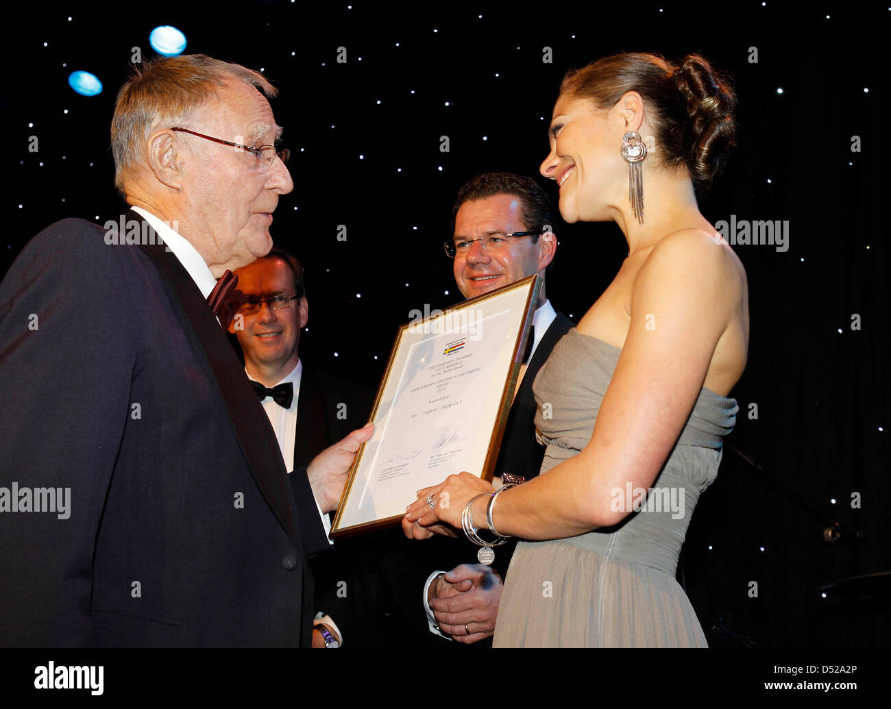 Crown Princess Victoria of Sweden (R) hands over The Swedish Chamber of Commerce Lifetime Achievement Award to 77-year-old founder of IKEA, Ingvar Kamprad (L) during the gala dinner on the 50th anniversary of the Swedish Chamber of Commerce in Noordwijk, the Netherlands, 28 October 2010. Photo: Reni van Maren/Pool ( NETHERLANDS OUT) Stock Photo