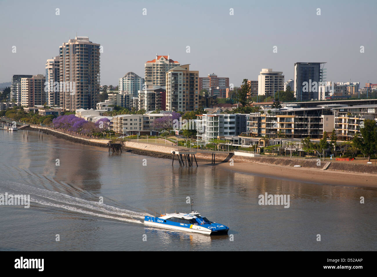 Brisbane City River ferry passing the residential apartment buildings on Kangaroo Point Brisbane Queensland Australia Stock Photo