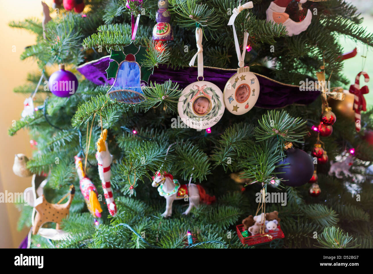 Ornaments on Christmas tree Stock Photo