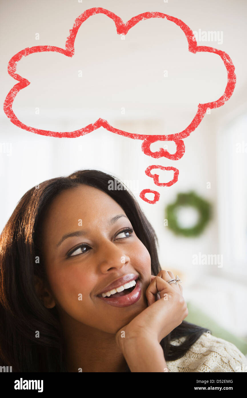 African American woman with thought bubble Stock Photo