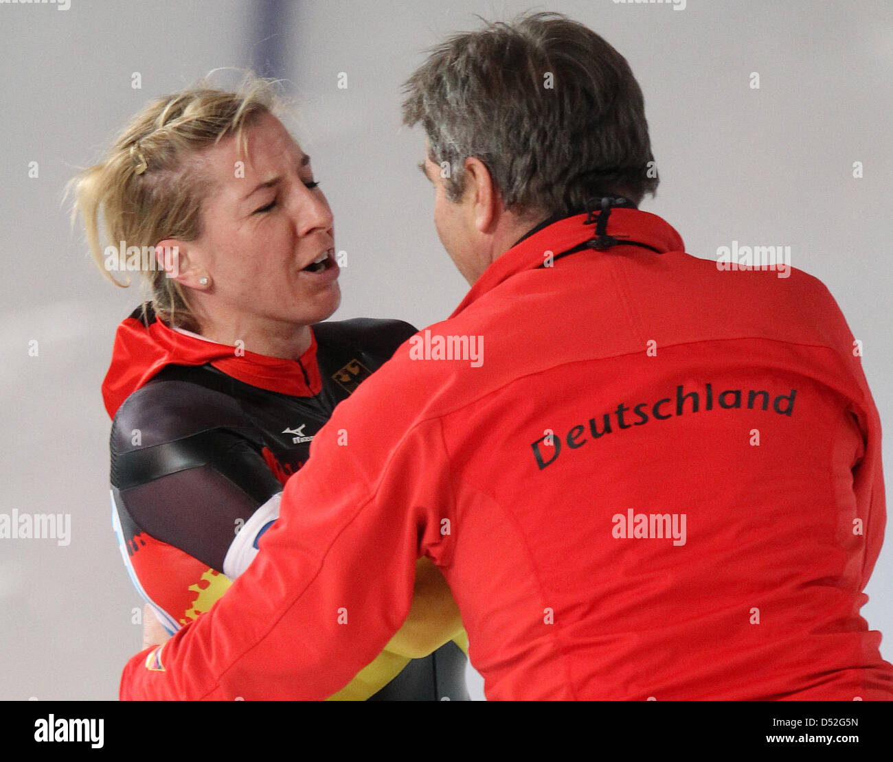 Anni Friesinger-Postma (L) of Germany and German team coach Markus Eicher after the Speed Skating women's team pursuit semifinals at the Richmond Olympic Oval during the Vancouver 2010 Olympic Games, Vancouver, Canada, 27 February 2010. Photo: Daniel Karmann  +++(c) dpa - Bildfunk+++ Stock Photo