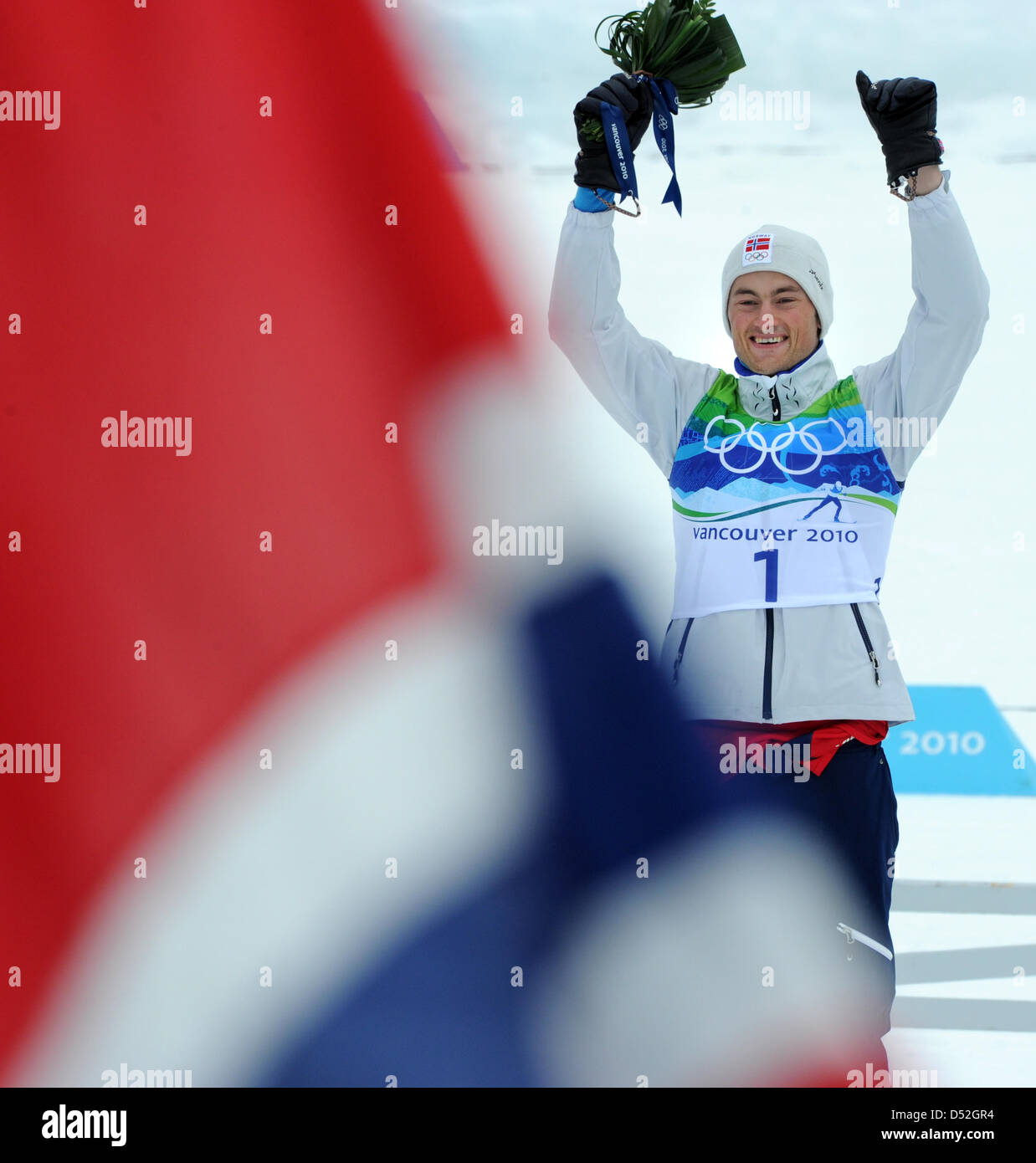 Norway s Gold Medal Winner Petter Northug Celebrates During The Flower norway-s-gold-medal-winner-petter-northug-celebrates-during-the-flower
