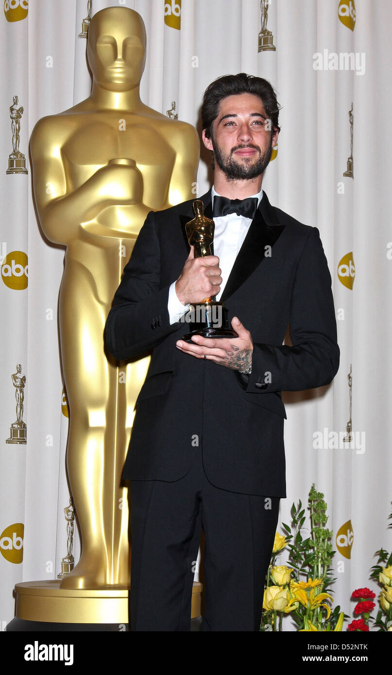 US recording artist Ryan Bingham holds his Oscar during the 82nd Annual