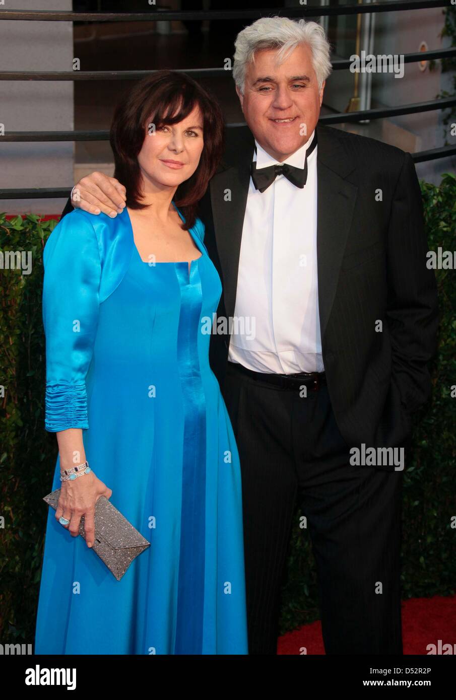US TV presenter Jay Leno and his wife Mavis Leno arrive at the Vanity Fair Oscar Party at Sunset Tower in Los Angeles, USA, 07 March 2010. Photo: Hubert Boesl Stock Photo