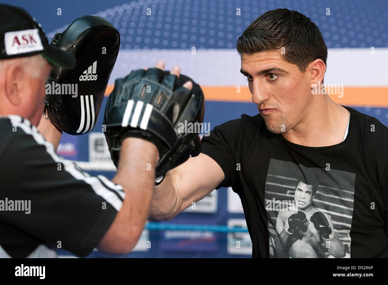 German WBO cruiserweight champion Marco Huck (R) and his coach Ulli Wegener (L) during a public training in Berlin, Germany, 09 March 2010. Huck aims to defend his WBO title against US contender Adam Richards on 13 March. Photo: ROBERT SCHLESINGER Stock Photo