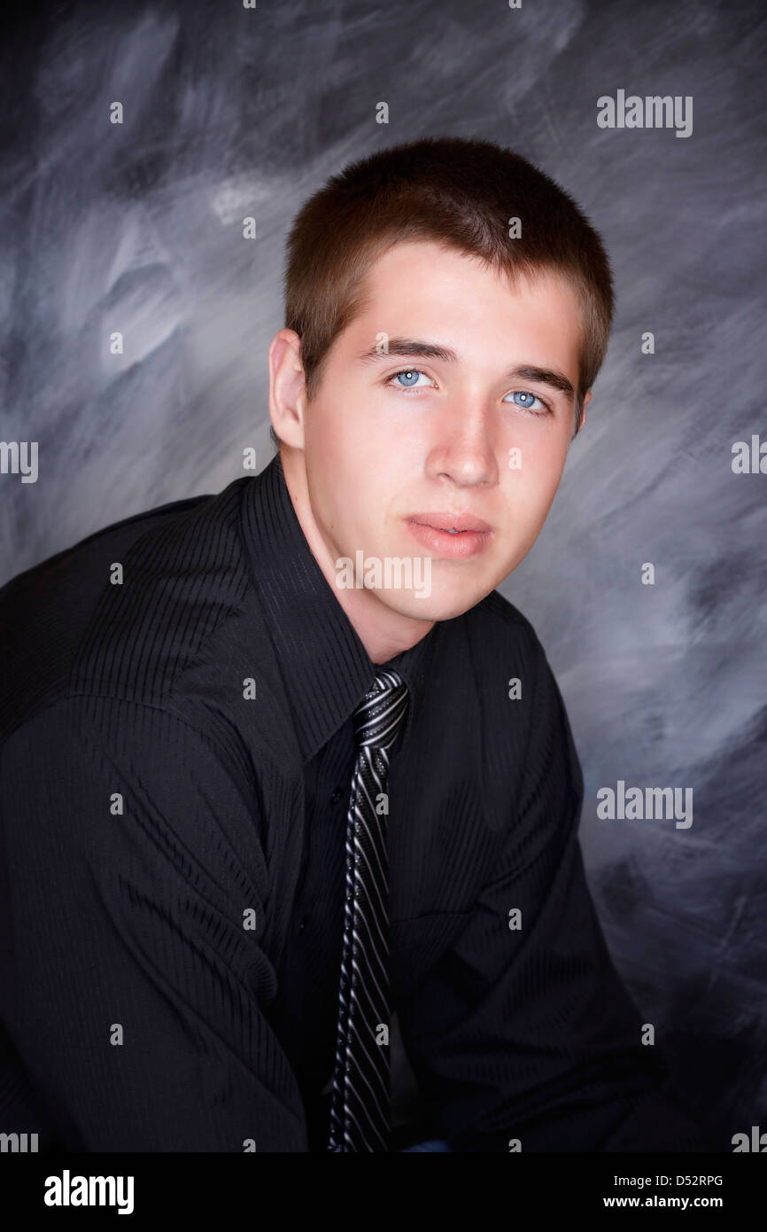 A teenage boy with short brown hair Stock Photo Alamy