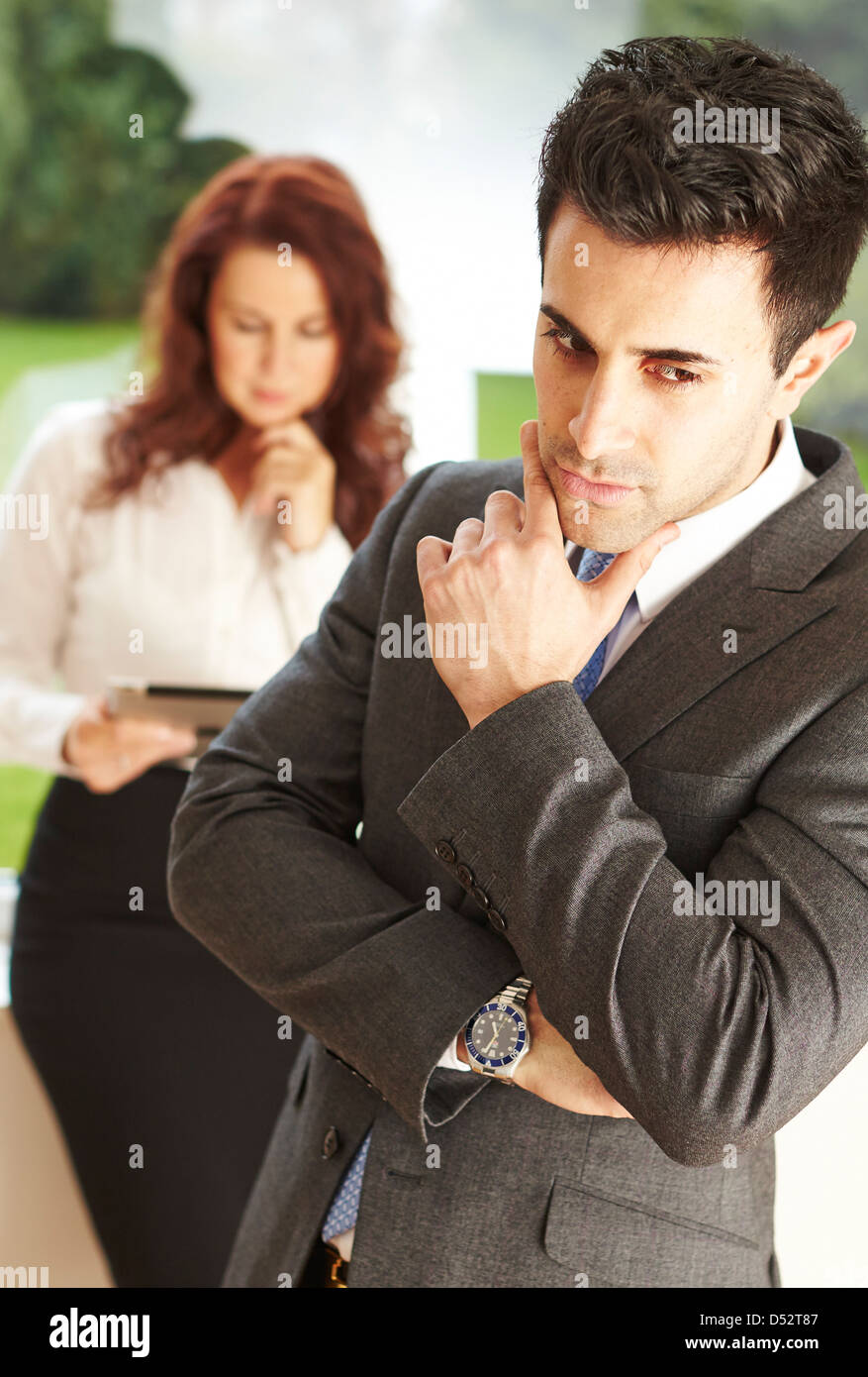Man and woman in office together Stock Photo