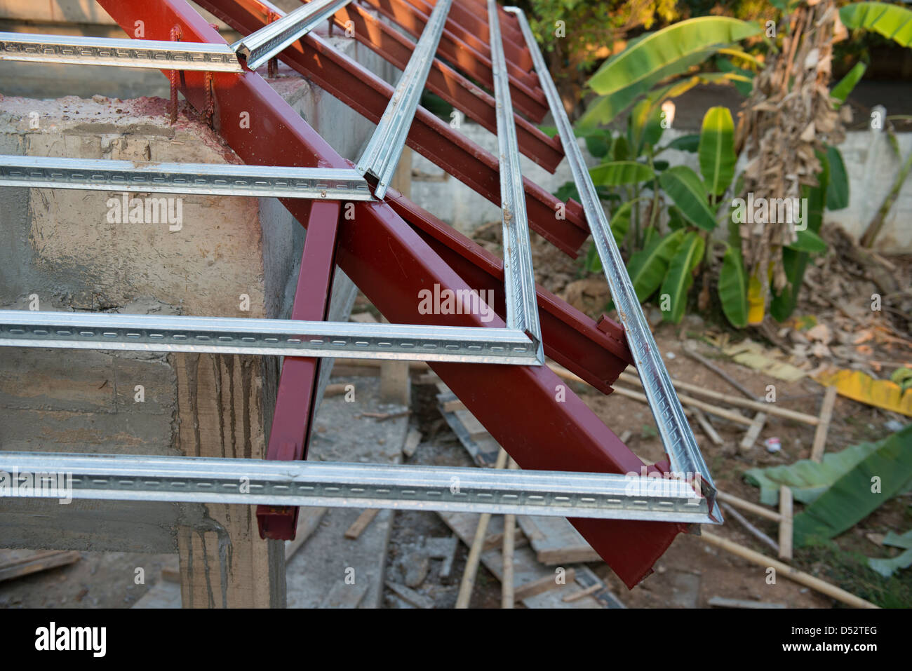 Thai house rafter construction with steel beam, normally used materials nowadays.   Lampang, Thailand Stock Photo