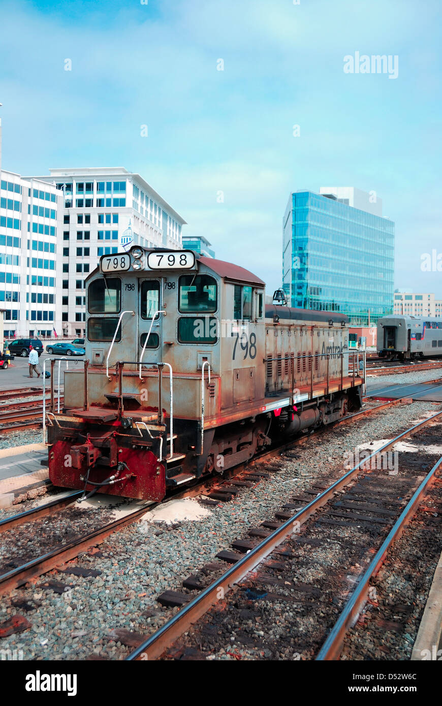 Old locomotive at train station Stock Photo