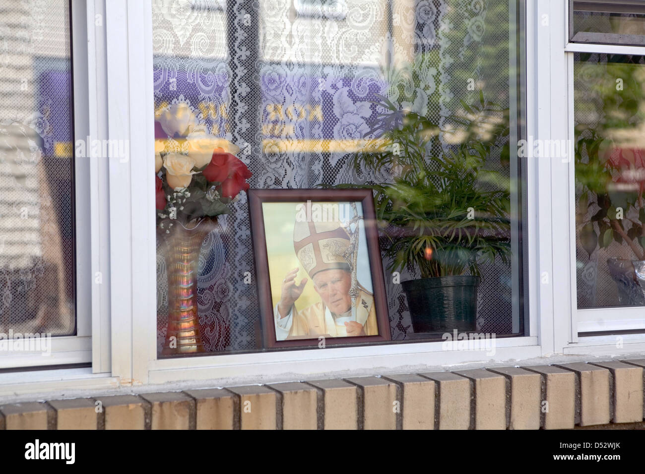 New York City, USA, a photo of the late Pope John Paul II in a window Stock Photo