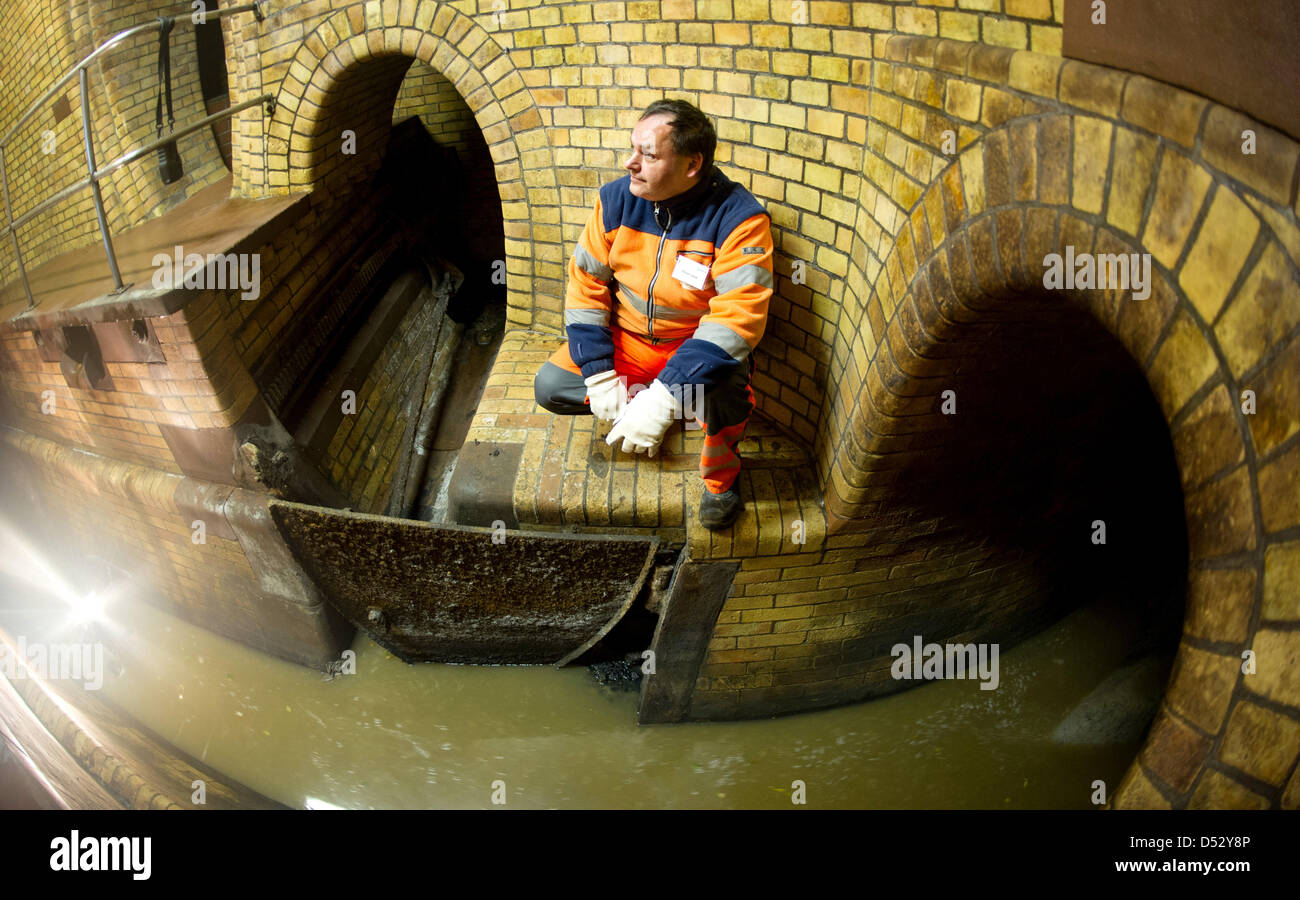 Caucasian Plumber Worker Wearing Safety Gloves Adjusting Water Sewage  Residential Stock Photo by ©welcomia 415928518