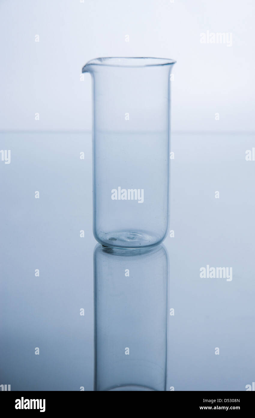 Test-tube with blue liquid isolated on white Stock Photo - Alamy