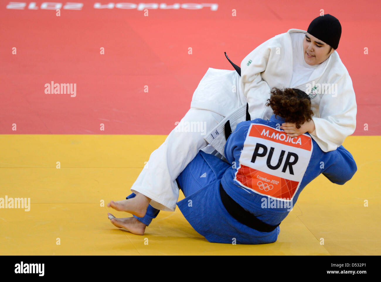 Wojdan Shaherkani (KSA, Saudi Arabia), the first Saudi female Judo athlete, is thrown by Melissa Mojica (PUR, Puerto Rico). Jud Stock Photo