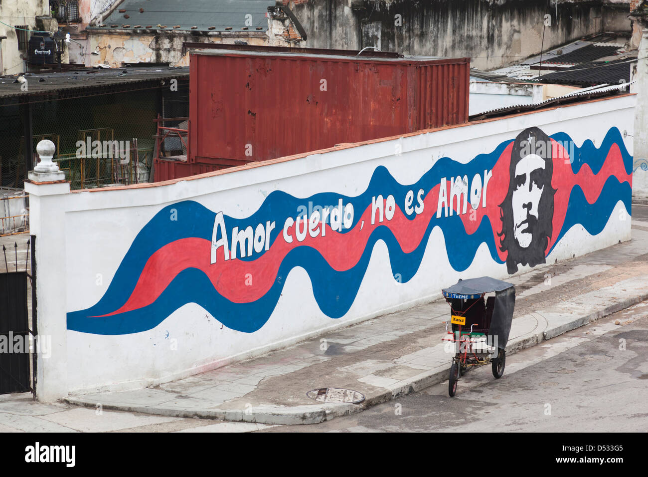 Cuba, Havana, Havana Vieja, Museo de la Revolucion, revolutionary wall mural with pedal taxi Stock Photo