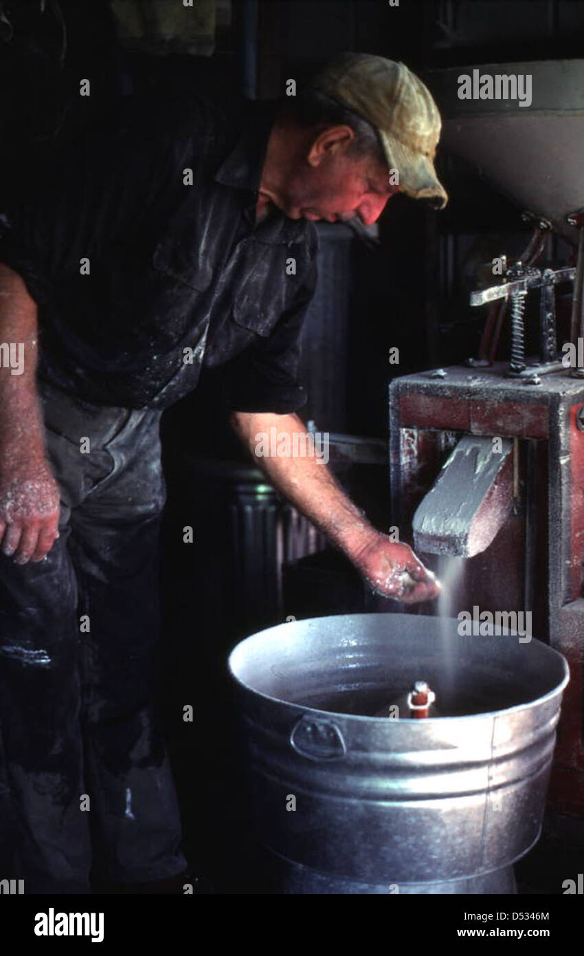 S.M. Blackman working with his grist mill: McAlpin, Florida Stock Photo