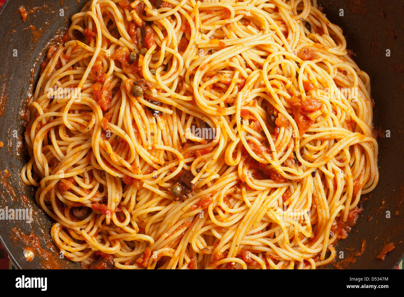 Spaghetti alla Puttanesca, the Roman classic Stock Photo