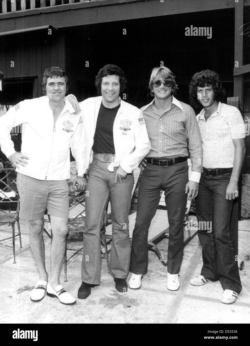 Tom Jones, second from left, poses with his band in Fort Lauderdale, Florida. This image, captured by Roy Erickson, highlights the famous Welsh vocalist known for his hit song 'It's Not Unusual.' Stock Photo
