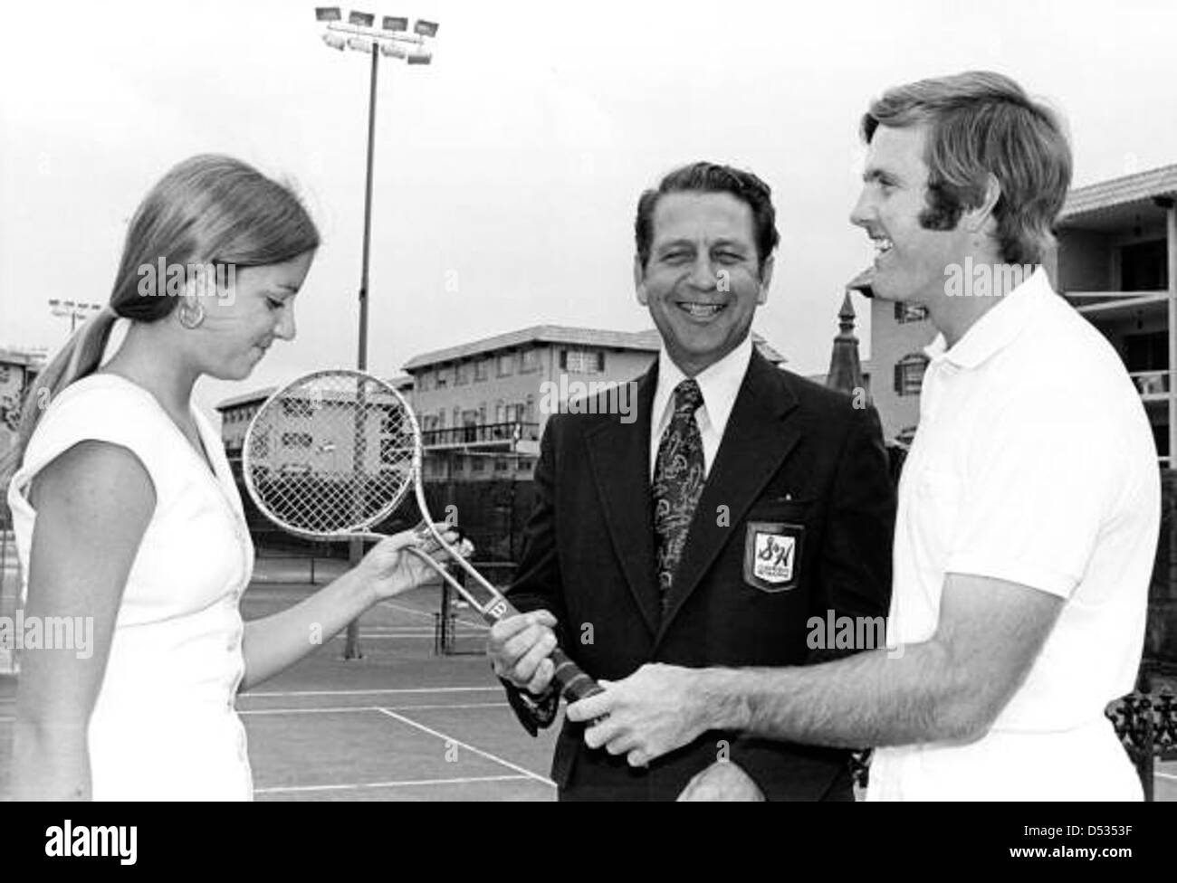 Professional athletes Chris Evert, tennis player at left, and Miami Dolphins quarterback Bob Griese, right, with a representative from S&H Green Stamps: Fort Lauderdale, Florida Stock Photo