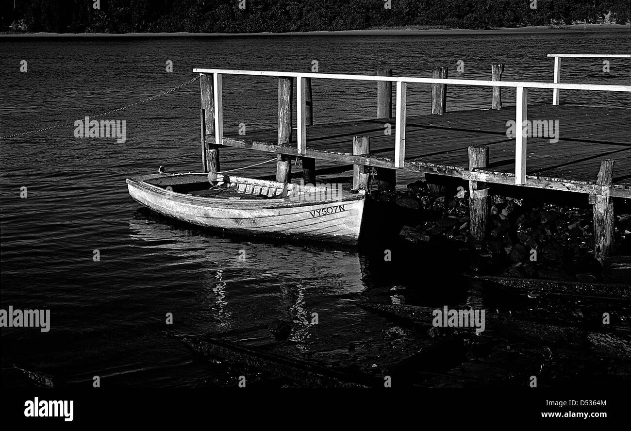 White boat moored Black and White Stock Photos & Images - Alamy