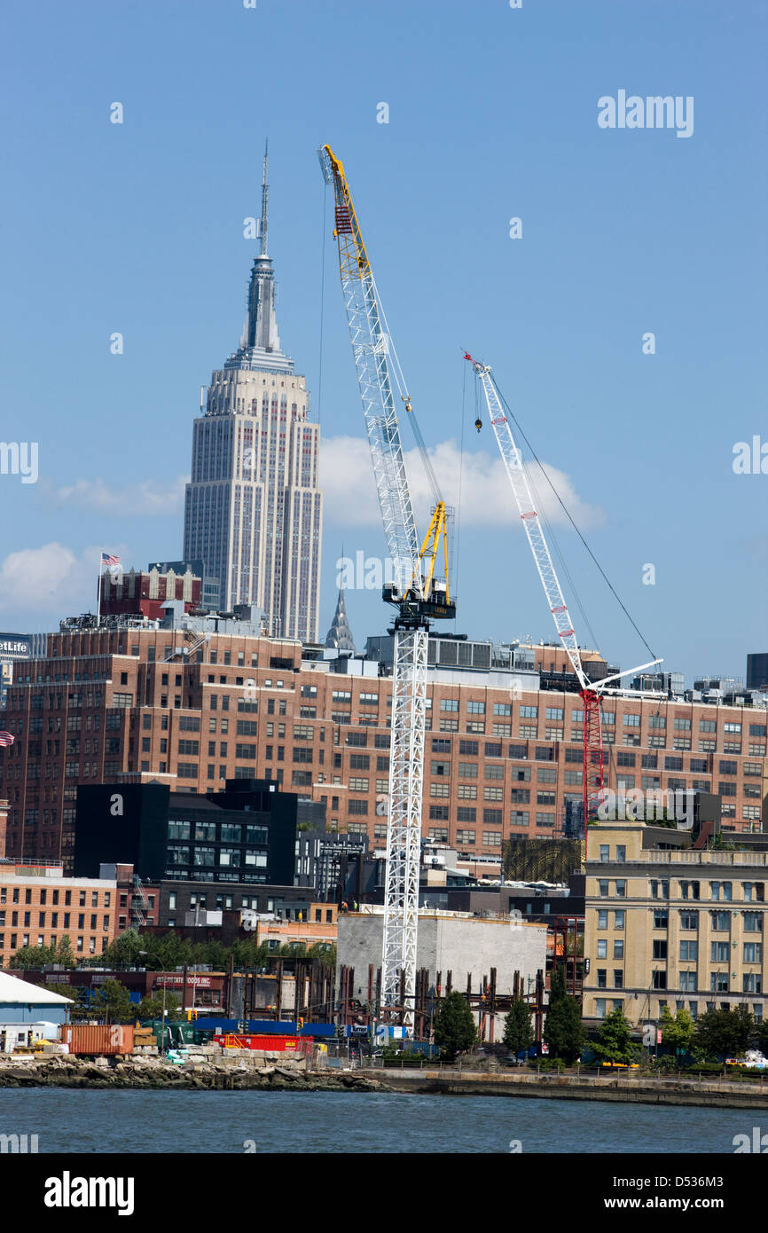 The Empire State Building and Chrysler Building with building site cranes viewed from the West Side in New York Stock Photo