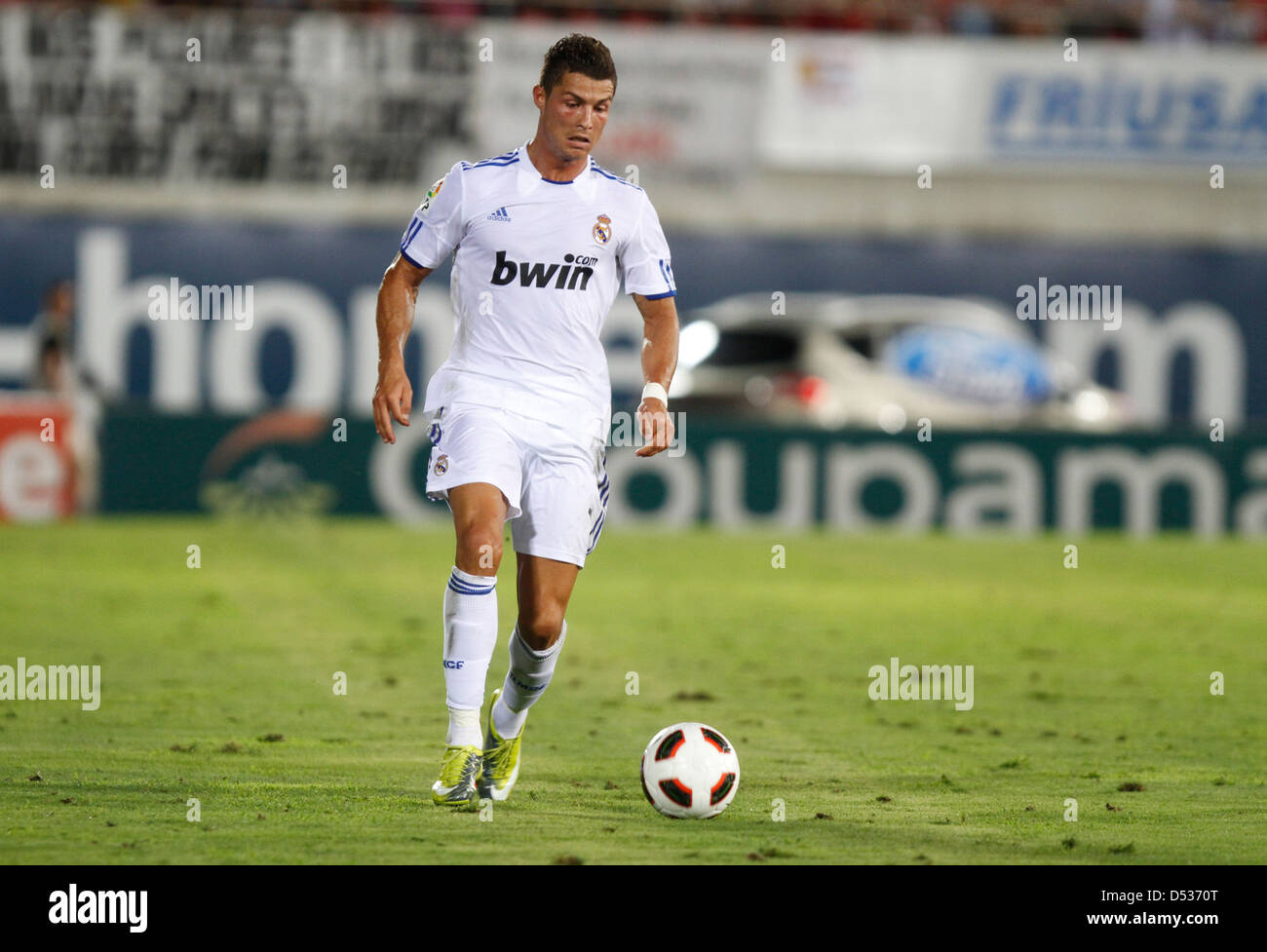 Real Madrid´s soccer player Cristiano Ronaldo controls the ball during a match Stock Photo