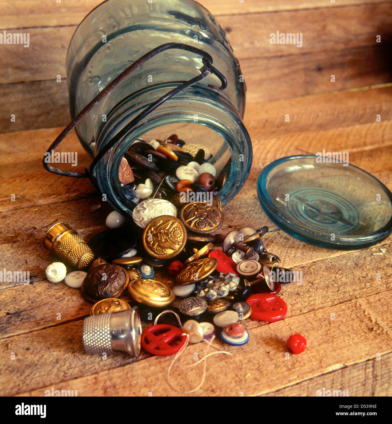 Display of sewing buttons in an old Mason style Jar. Lincoln Nebraska NE USA Stock Photo