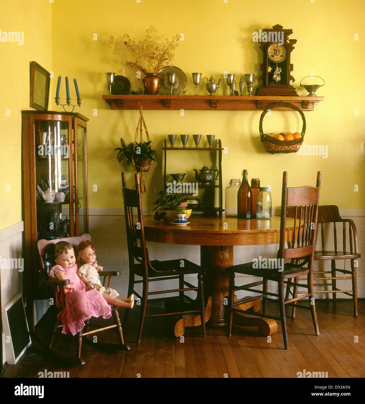 Antique corner of an American home filled with furniture and collectables Lincoln Nebraska NE USA Stock Photo
