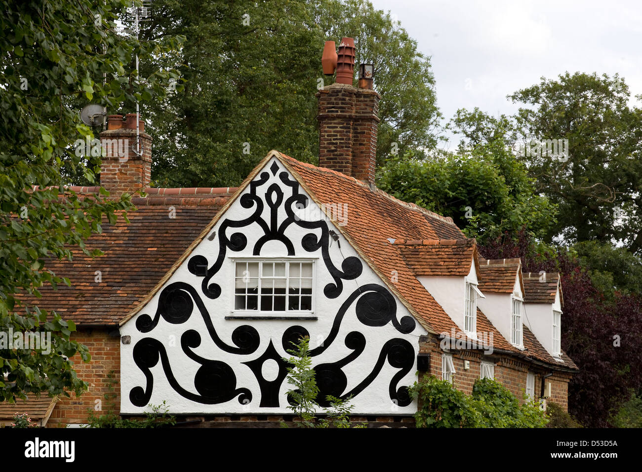 Tatch Houses in Denham Village, United Kingdom Stock Photo