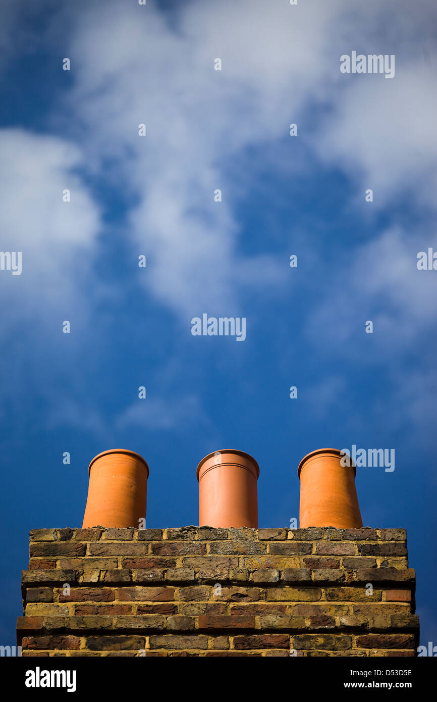 The Trio of Chimneys against a Blue Sky, Denham - UK Stock Photo