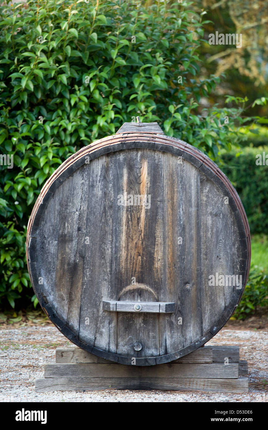 The Wine Barrel Sitting in the Gardens of the Agriturismo in Tuscany, Italy Stock Photo