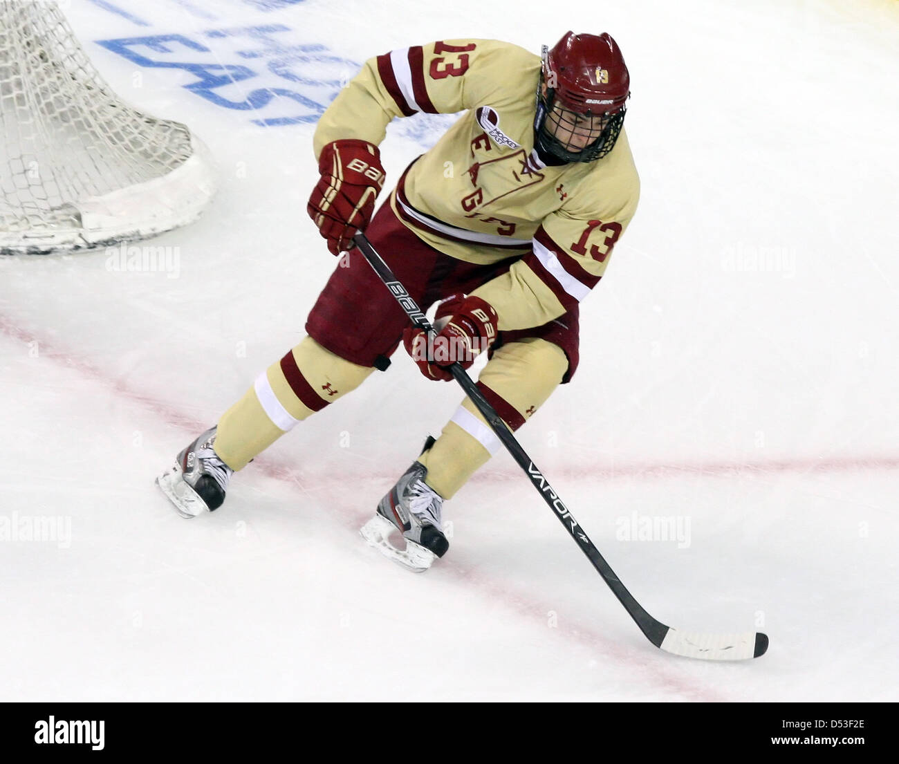 March 22, 2013 - Boston, Massachusetts, United States - Boston College  Eagles forward Johnny Gaudreau (13) collides with Boston University  Terriers forward Danny O'Regan (10) during the first period of the Hockey