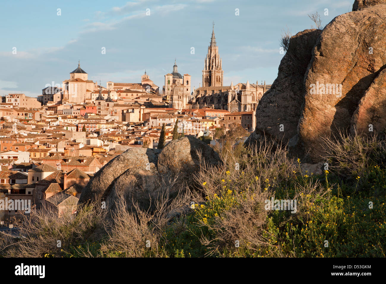 Toledo - Cathedral and Jesuits and other churches and old town in morning light and the rocks Stock Photo