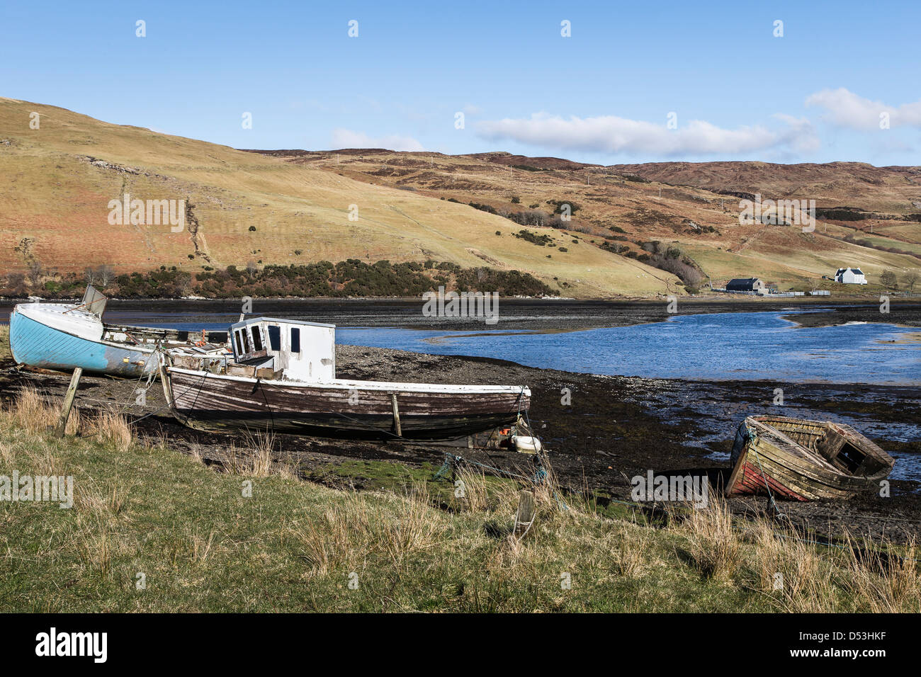 Beached boats at Loch Harport on the Isle of Skye in Scotland. Stock Photo