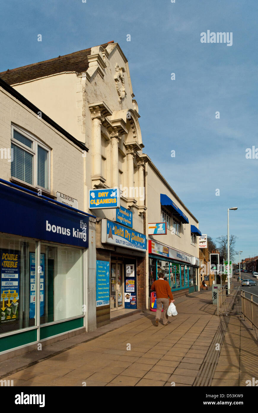 A line of shops in Kingsthorpe, Northampton, with the arched frontage