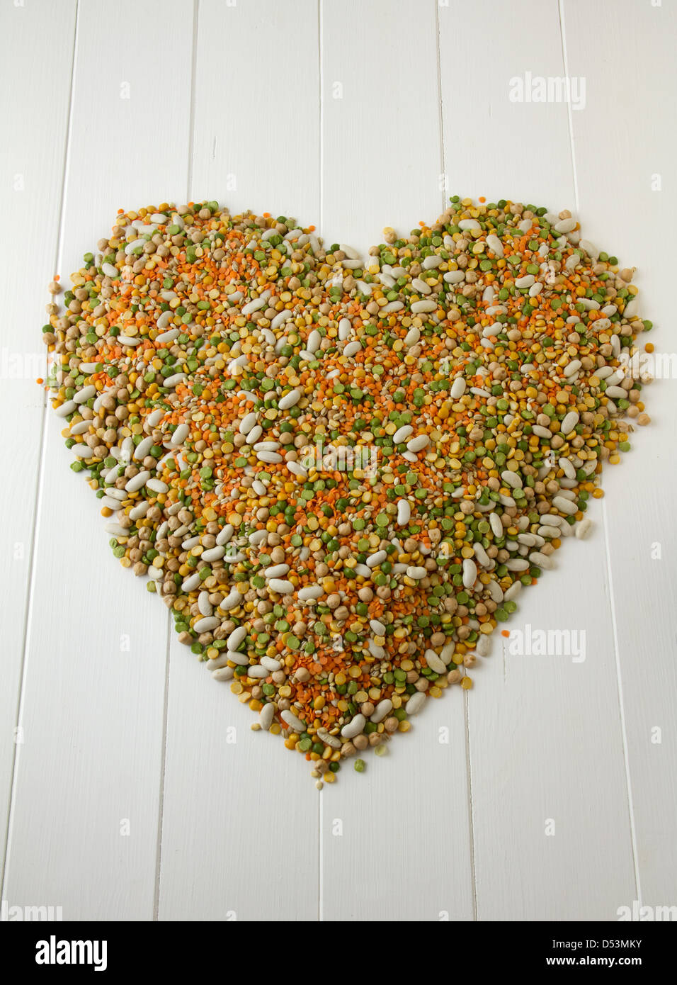 Mixed grains, pulses, beans, peas and legumes, shaped into a heart on