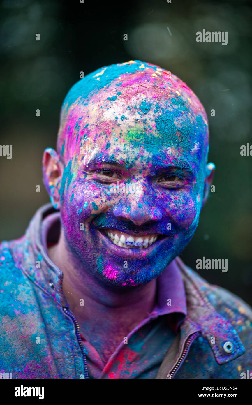 London, UK. 23rd March 2013. a man with powder on his face poses for a ...
