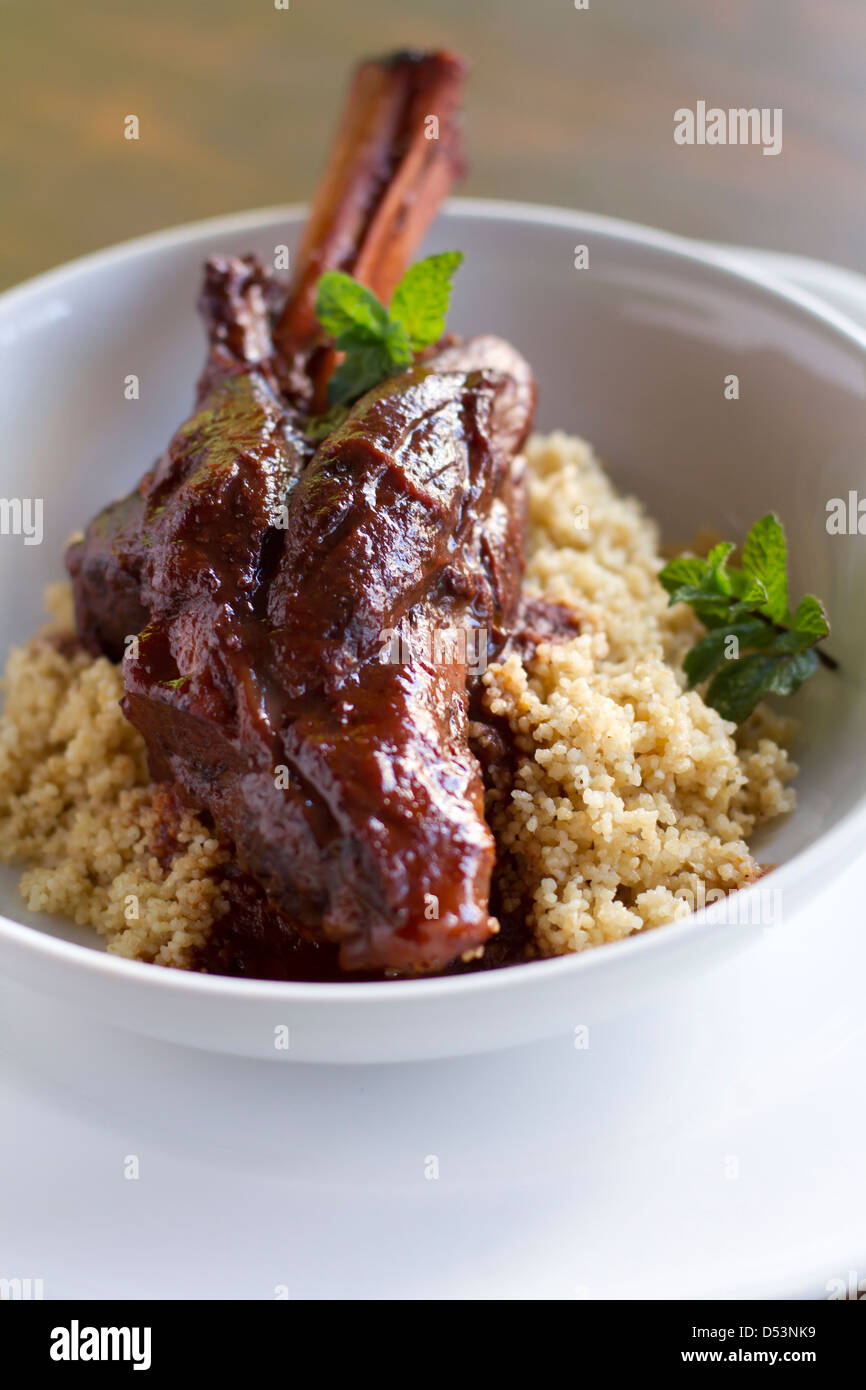 Indian spiced braised lamb shank Stock Photo