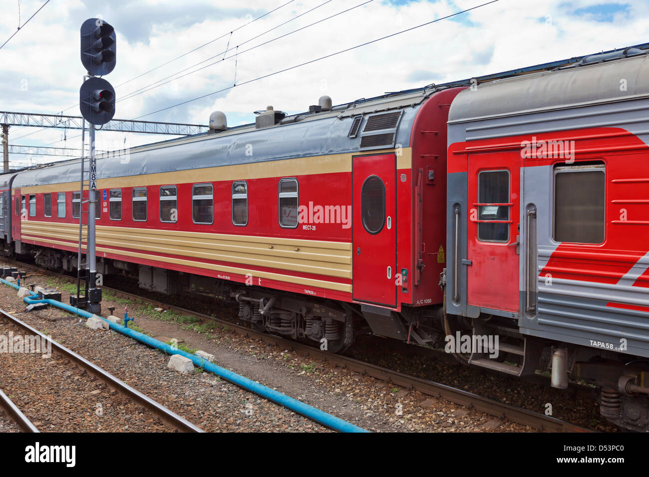 View of the railway track and passenger train in Russia Stock Photo - Alamy