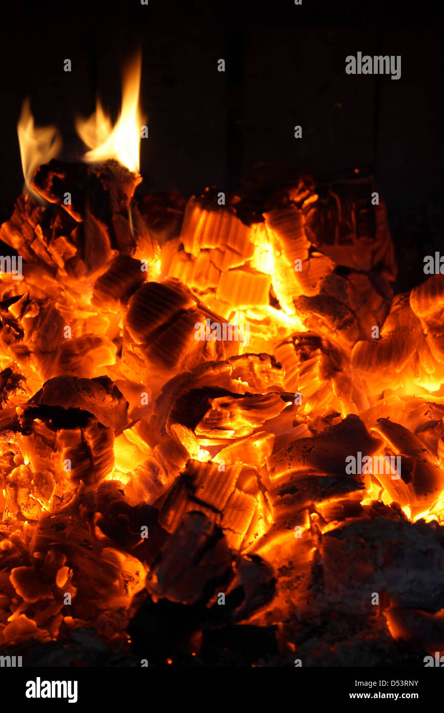 Glowing coals and fire flames in the fireplace Stock Photo Alamy