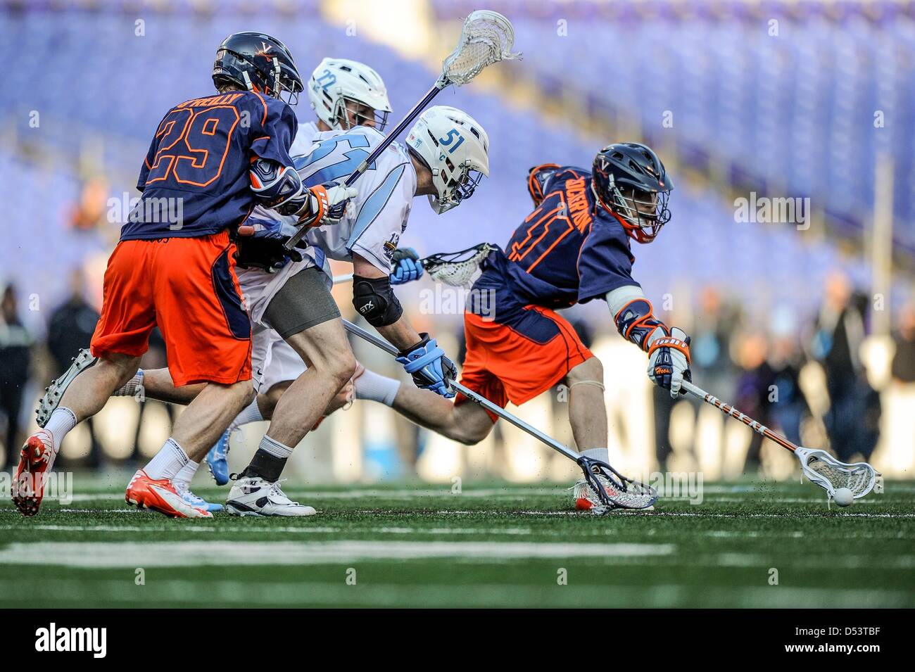 March 23, 2013 : Virginia's Mark Cockerton (41) tries to scoop in a