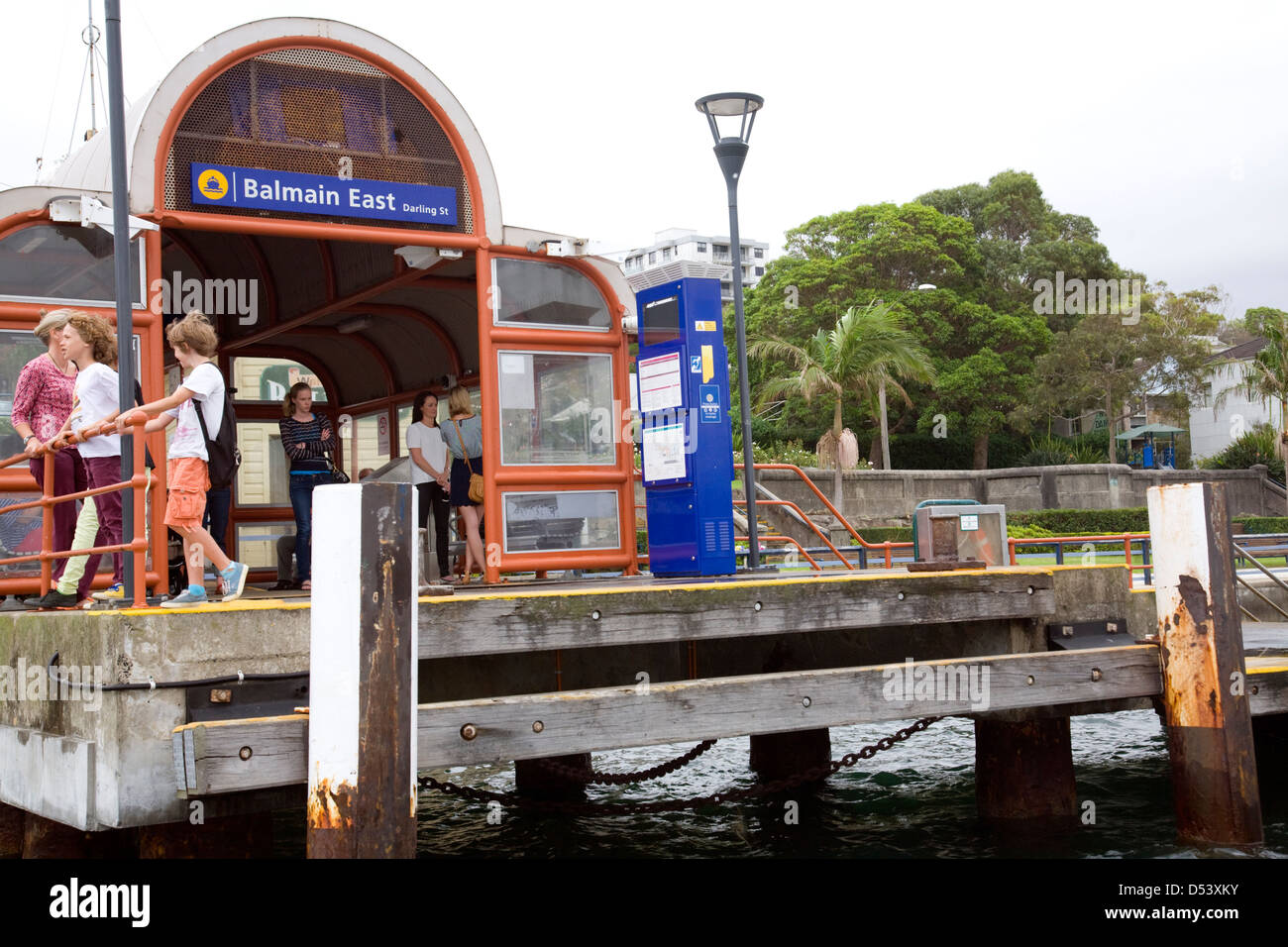 Balmain east sferry wharf on Sydney harbour with passengers and children waiting to board a Sydney ferry,NSW,Australia Stock Photo