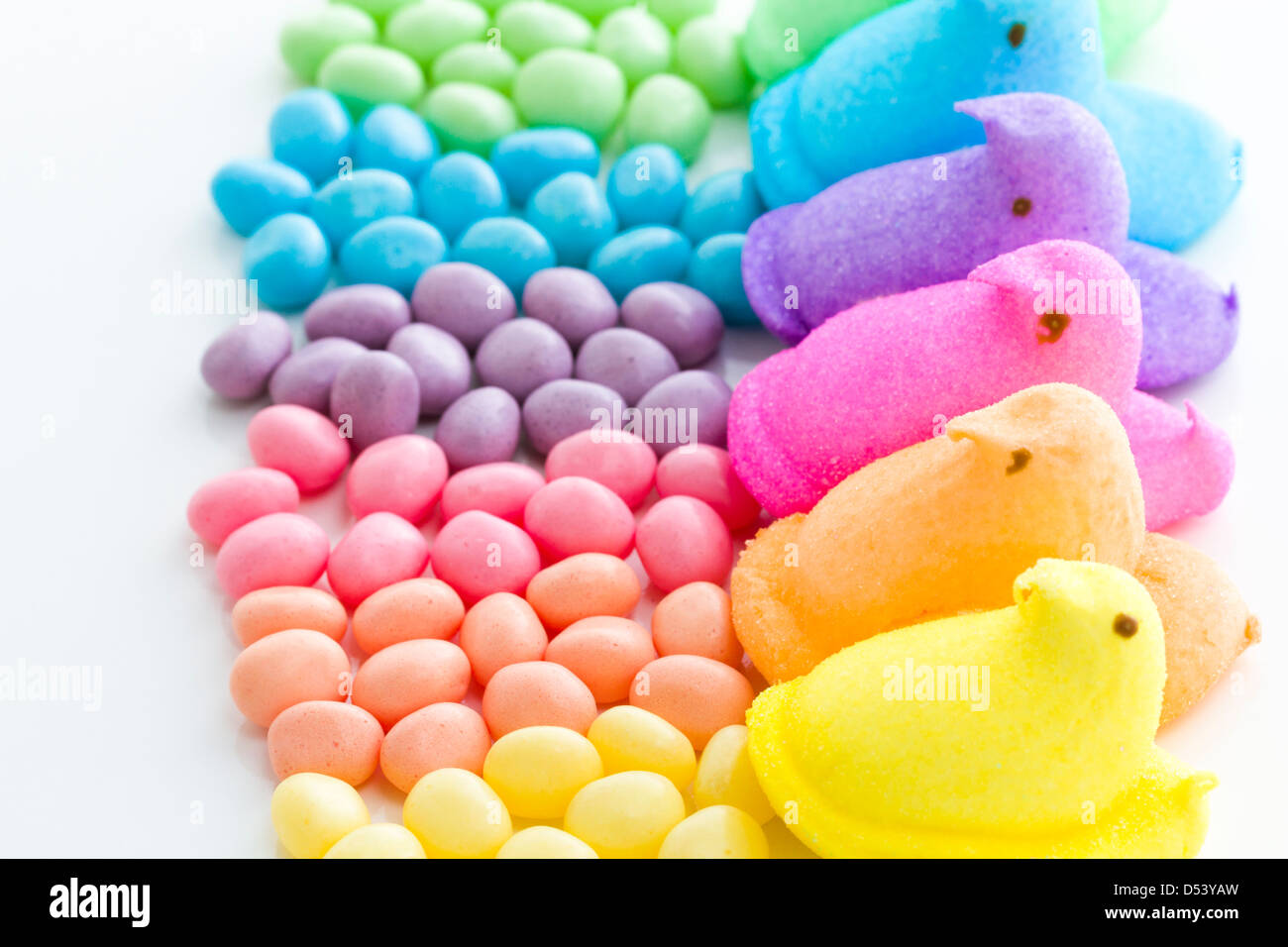 Rainbow color marshmallow peeps and jelly beans Stock Photo Alamy